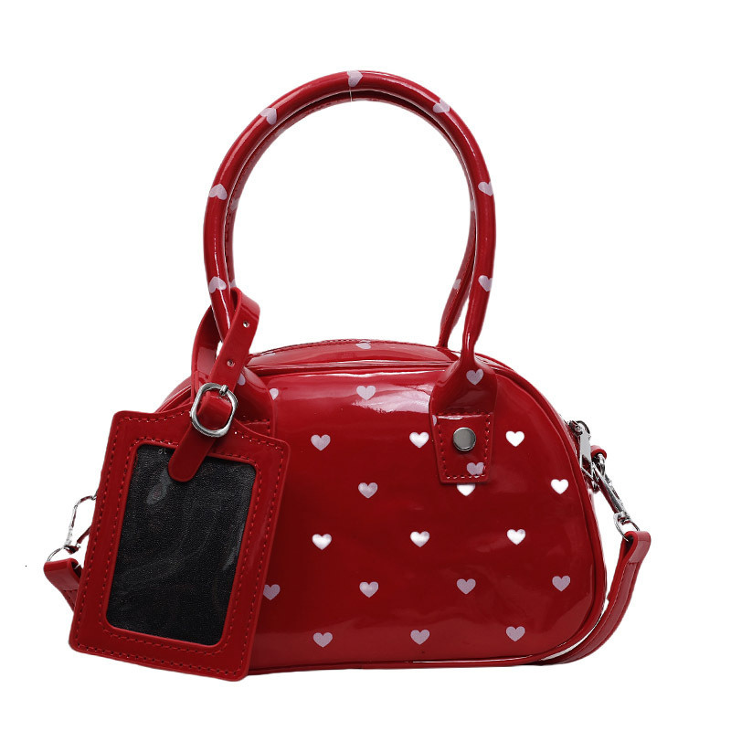 designer Korean Style Cute Polka Dot Handbag for Women 2025 New Niche Design Handheld Bag Commuter Shoulder Crossbody Small Bag