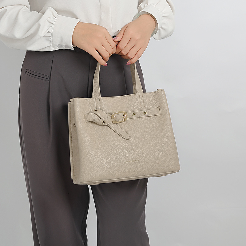 Free shipping Luxury Summer New Handheld Tote Bag Niche Design High-end Commuter Designer bags Versatile Shoulder Crossbody Bucket Bag