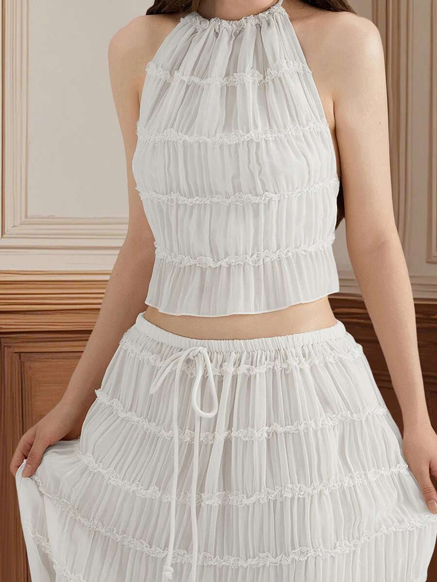 Elegant Lace Halter Neck Sleeveless Blouse with Open Back and Pleated Detailing for Summer Events and Parties