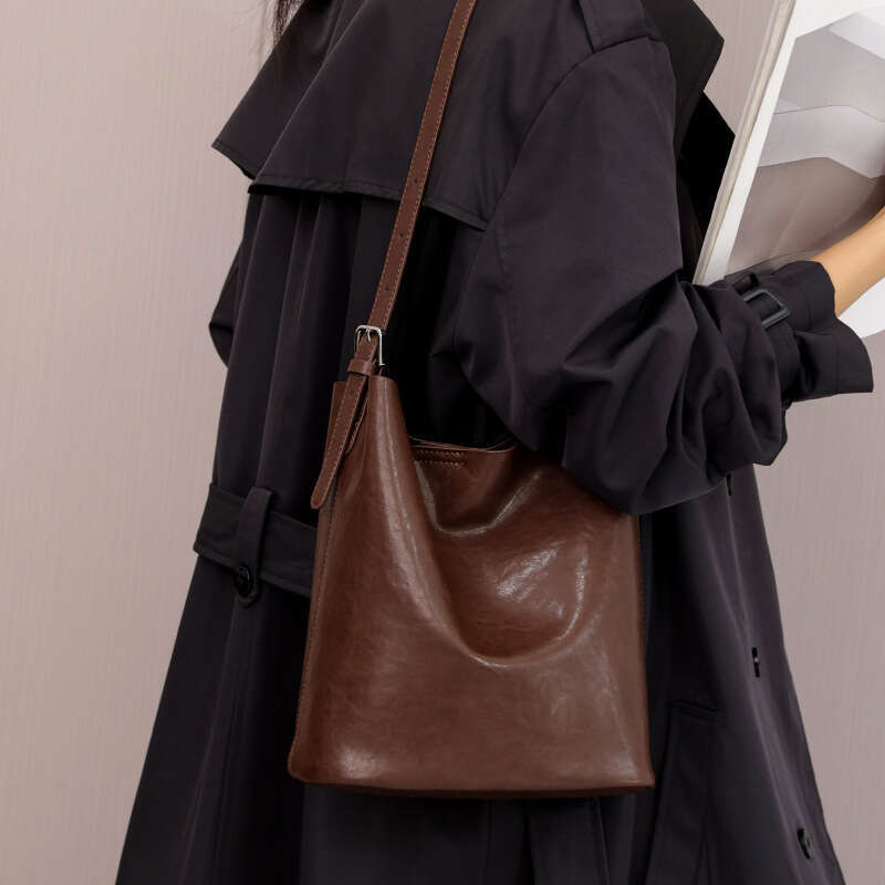 Leather bucket bag women's designer bags fashion retro crossbody bag commuting shoulder bag 2025 new genuine leather