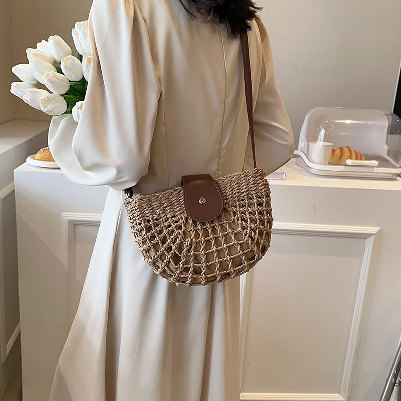 designer Summer Beach Vacation Woven Saddle Bag for Women 2025 New Trendy Versatile Casual Commuter Crossbody Straw Bag