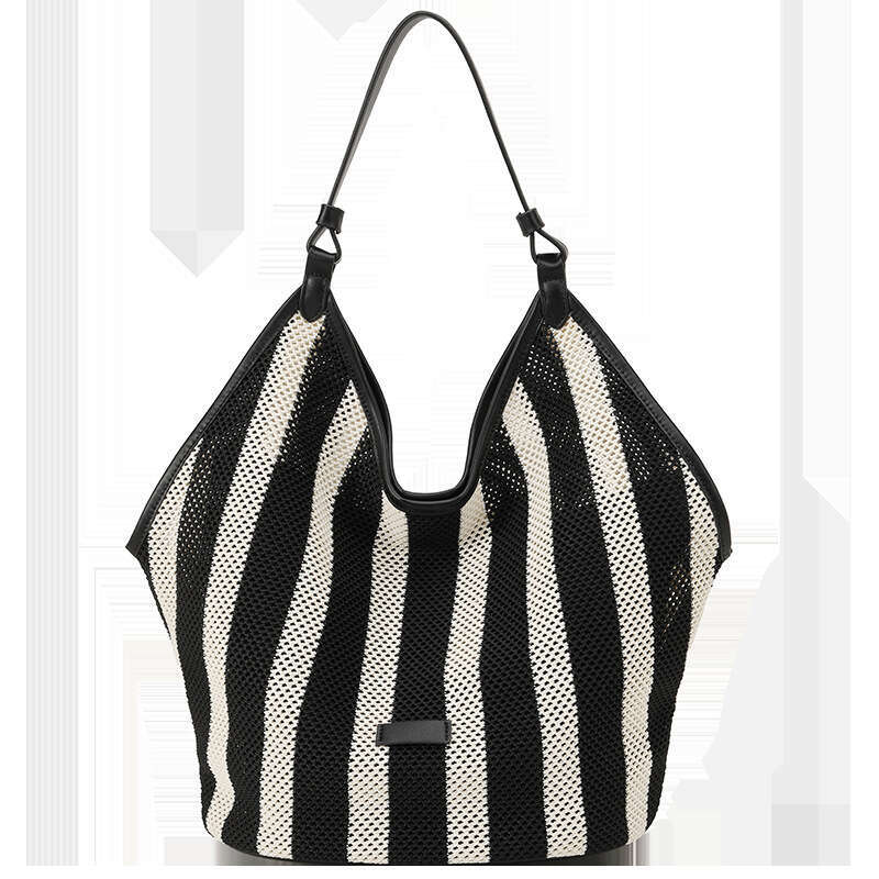 Guangzhou Vacation Hollow Woven Tote for Women Summer Casual Large Capacity Straw Bucket Bag GUHUISHU