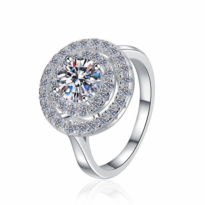 Artisan Crafted Wedding Band Highlighting A Lustrous Single Cut Moissanite Gemstone Amidst Floral Design