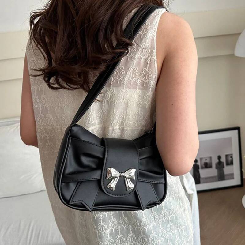 Men's single-shoulder bags, small niche ones with underarm bow ties, women's sweet and cool clutch bags