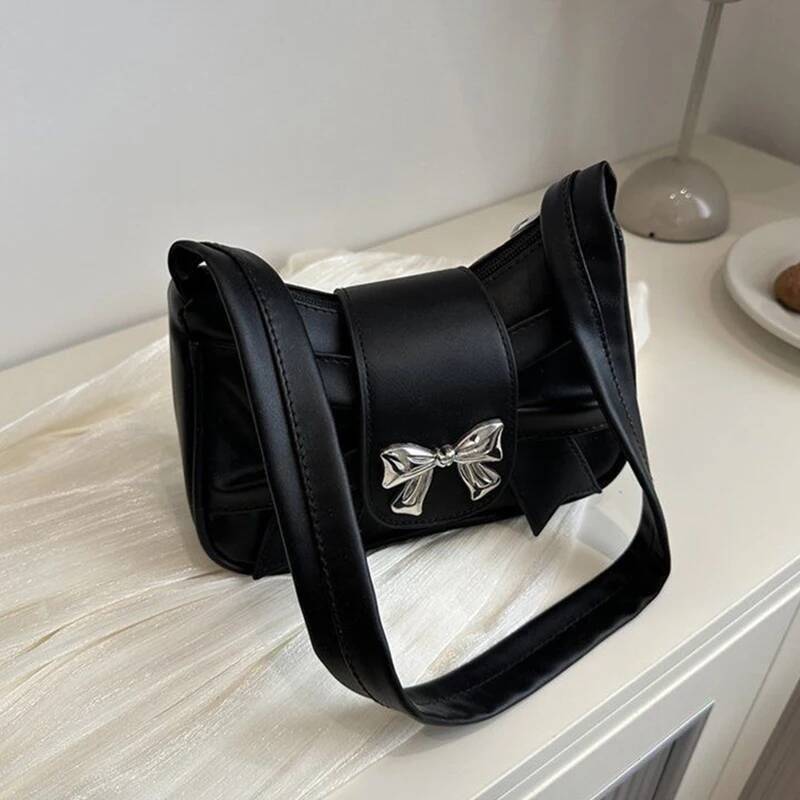 Men's single-shoulder bags, small niche ones with underarm bow ties, women's sweet and cool clutch bags