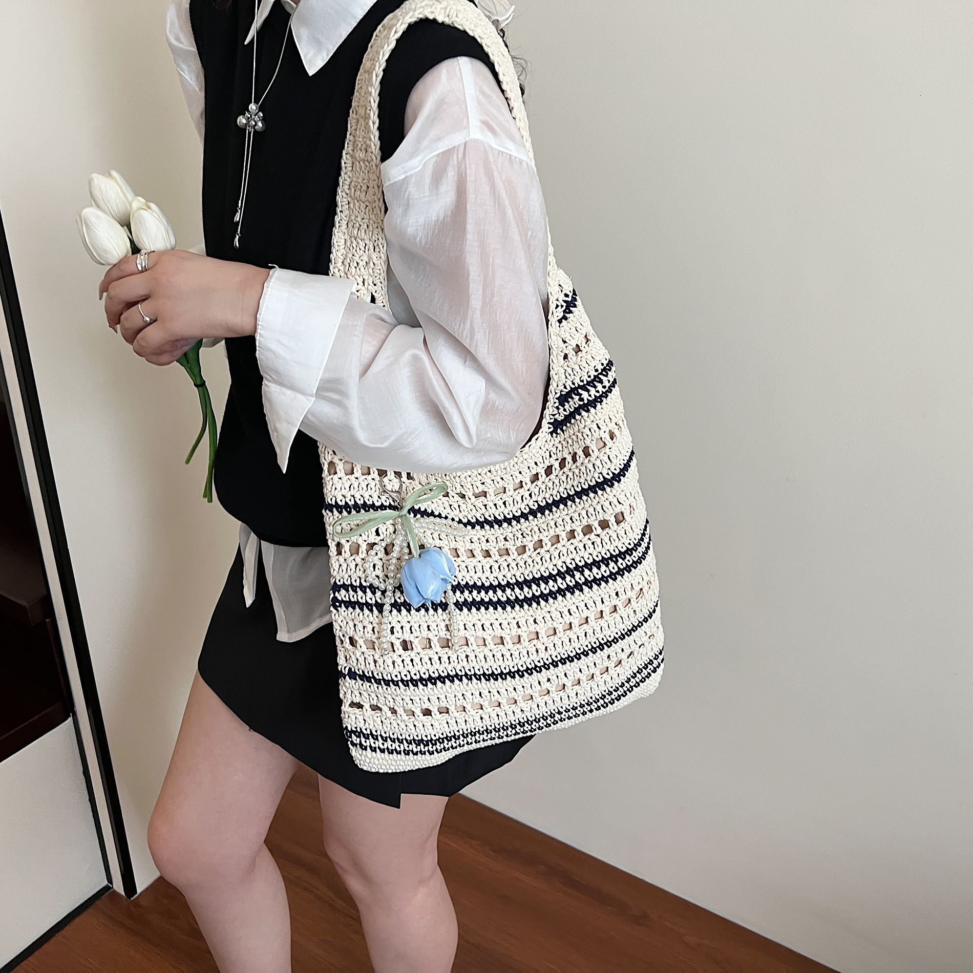 designer Niche Design Handwoven Bag 2025 New Striped Cotton Rope Women's Bag Trendy Hollow Handbag Shoulder Beac