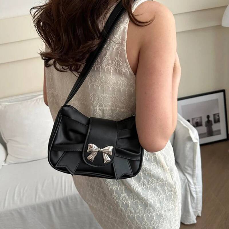 Men's single-shoulder bags, small niche ones with underarm bow ties, women's sweet and cool clutch bags