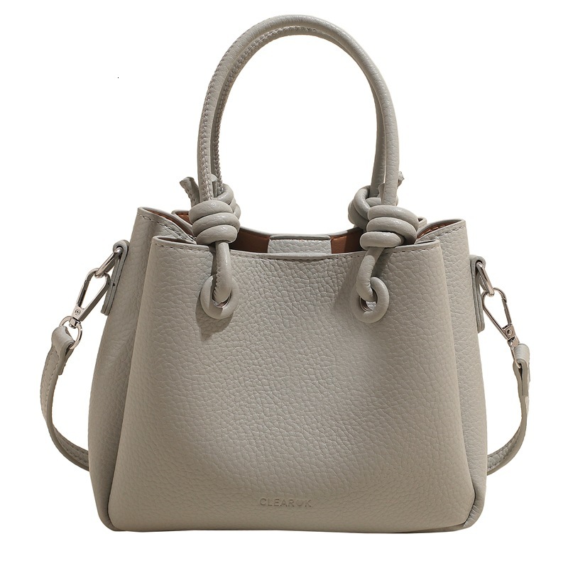 designer Niche Simple Trendy Fashion Handheld Bucket Bag for Women 2025 New Casual Commuter Handbag Shoulder Crossbody Bag