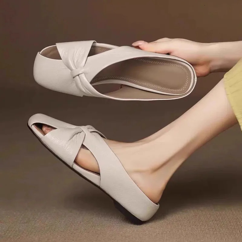 Summer Baotou Hollow Flat Shoes Womens Outer Slippers Fashion Soft Leather No Heel Soft Sole Lazy Half Slippers 250603