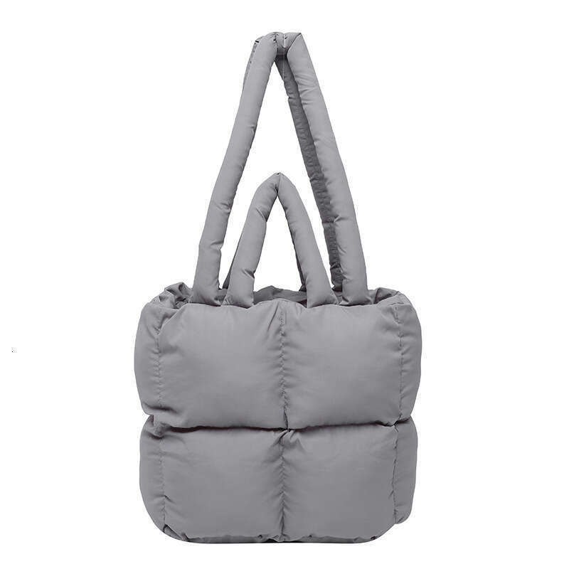 Fashion Handheld Down Simple Niche Versatile Women's Bag Design Sense 2025 Spring Summer New Bread Handbag