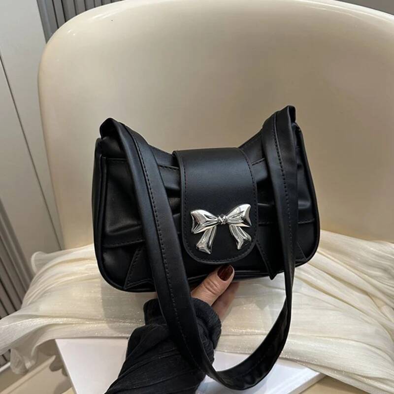 Men's single-shoulder bags, small niche ones with underarm bow ties, women's sweet and cool clutch bags