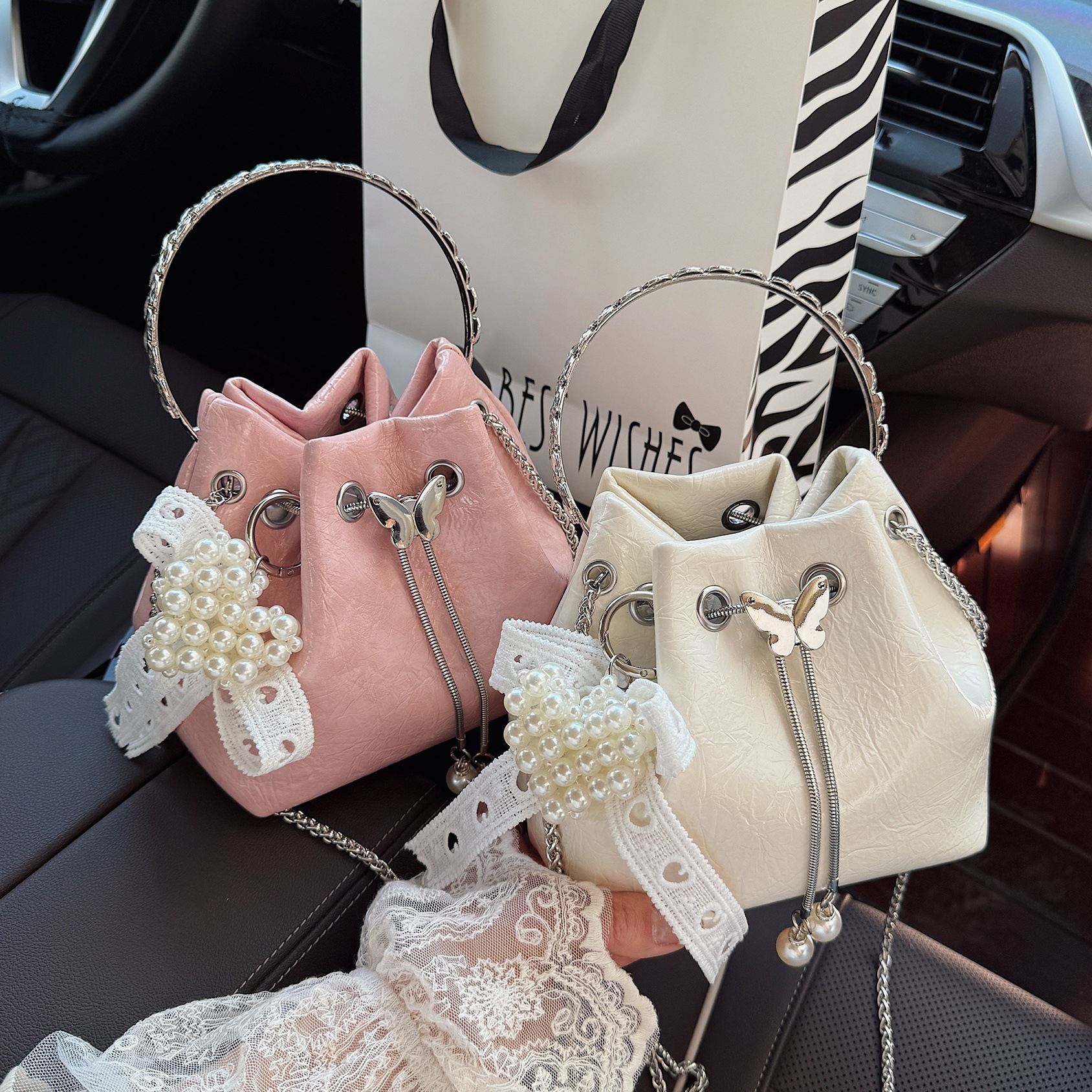 designer 2025 Summer New High-End Handheld Bucket Bag for Women with Chain Drawstring Shoulder Bag Niche Crossbody Ha