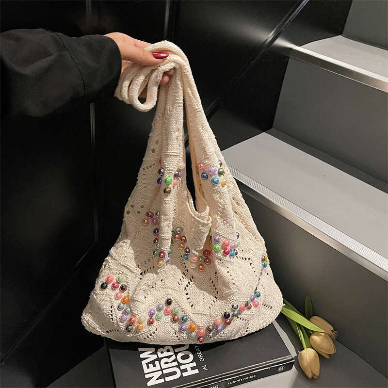 2025 New Woven Women's Shoulder Ins Niche Design Shopping Bag Casual Trend GUHUISHU