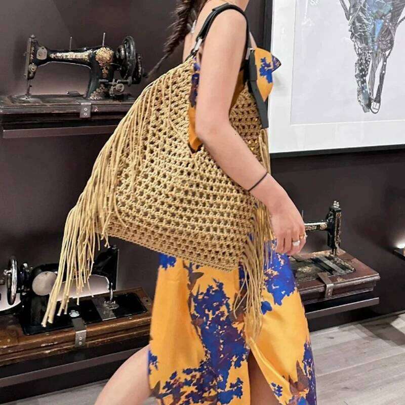 2025 New Woven Hollow Women's Handbag Shoulder Fashion Tassel Large Capacity Tote Bag