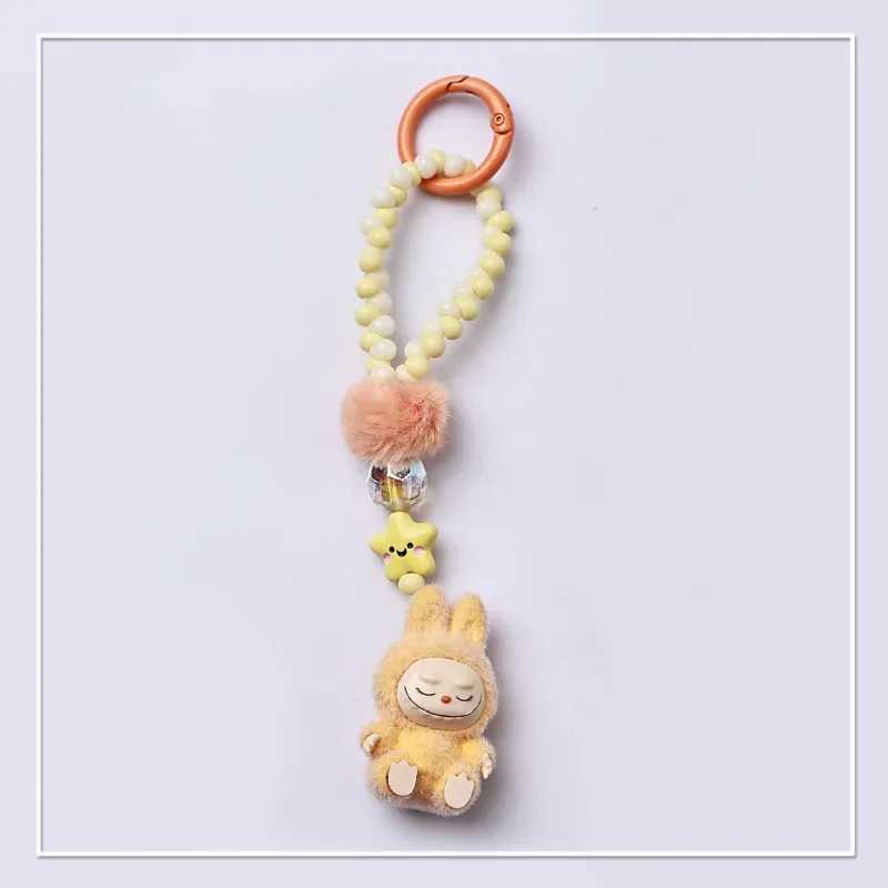 Kawaii Mini Labubu Keychain Cartoon Creative Three-dimensional Doll Students Schoolbag Pendant Car Key Chain Women and Men Gifts XJ250607