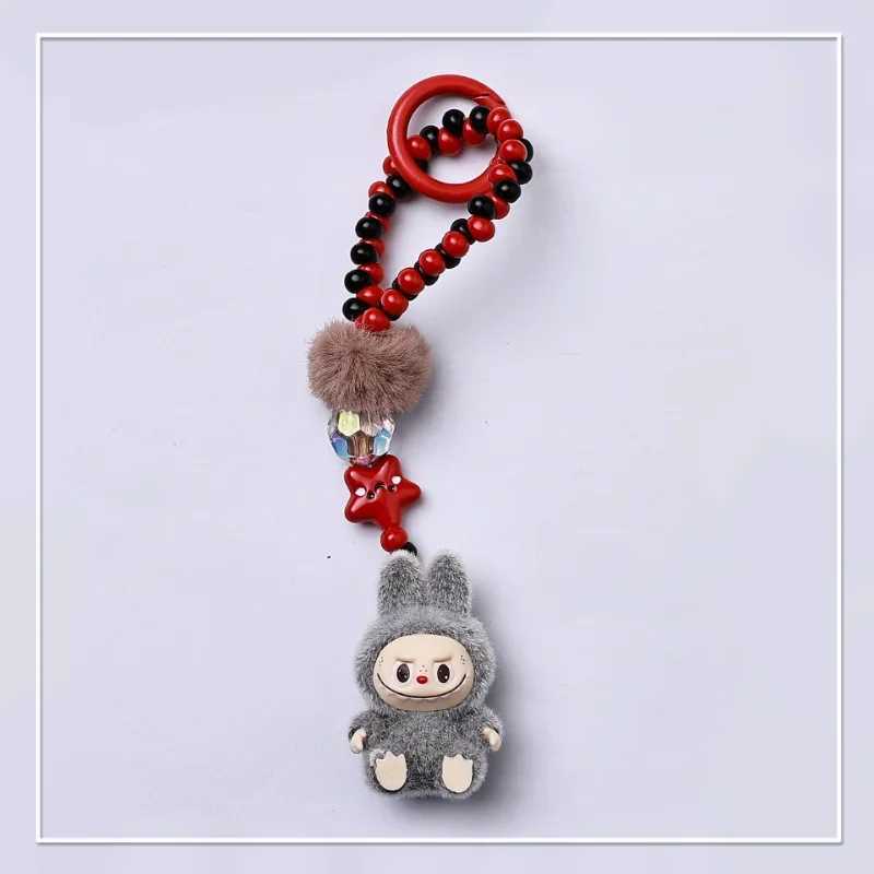 Kawaii Mini Labubu Keychain Cartoon Creative Three-dimensional Doll Students Schoolbag Pendant Car Key Chain Women and Men Gifts XJ250607