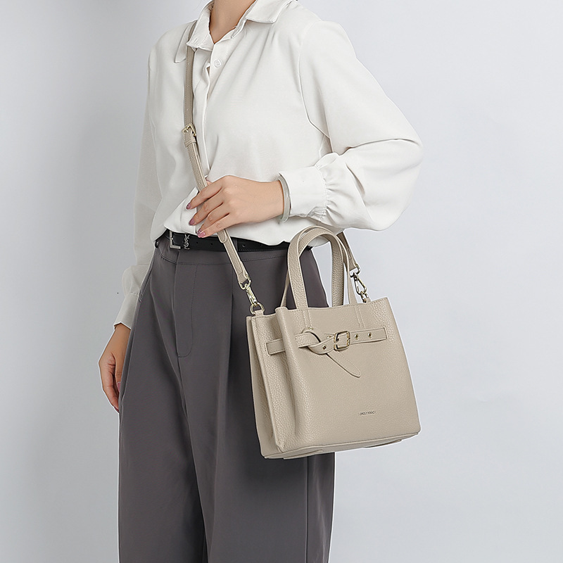 Free shipping Luxury Summer New Handheld Tote Bag Niche Design High-end Commuter Designer bags Versatile Shoulder Crossbody Bucket Bag