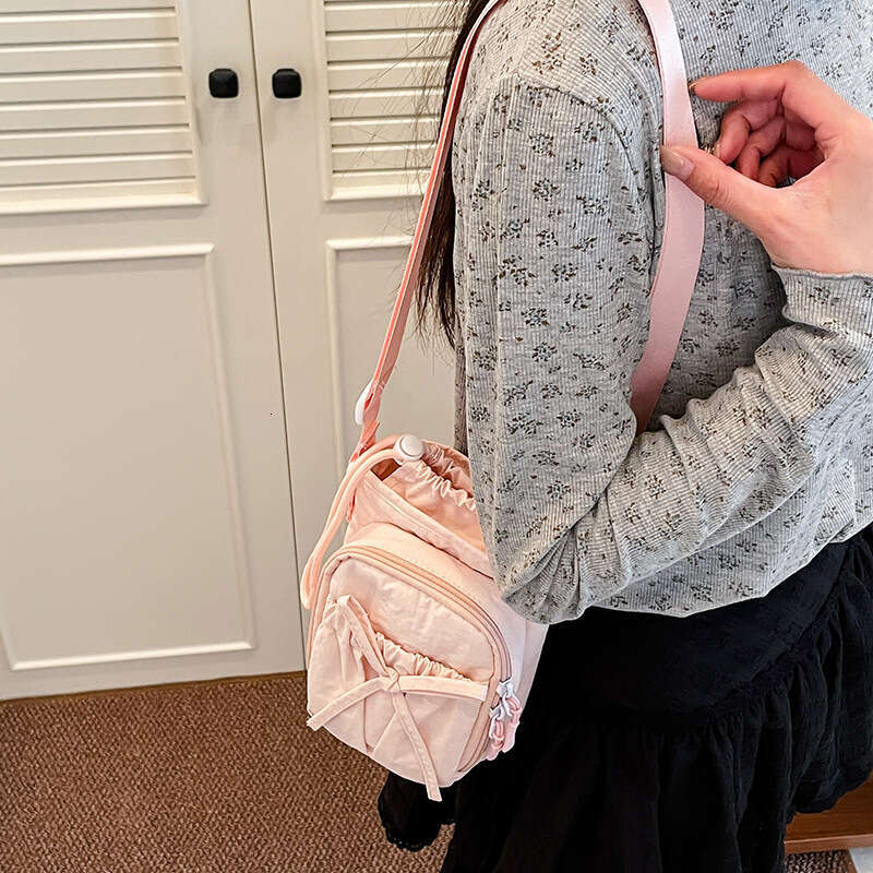 Korean Style Crossbody for Women 2025 New Simple Bowknot Small Square Casual Outdoor Phone Versatile Water Bottle Bag