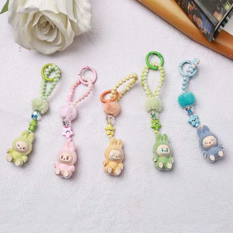 Kawaii Mini Labubu Keychain Cartoon Creative Three-dimensional Doll Students Schoolbag Pendant Car Key Chain Women and Men Gifts XJ250607