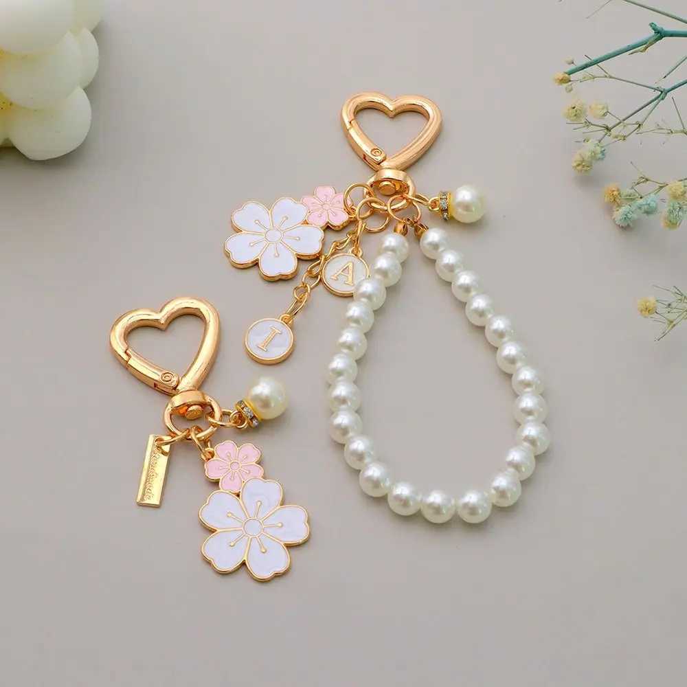 Lovely Cherry Blossoms Keychain Pearl Chain Letter Pendant Women Car Key Ring Headphone Case Charms Bag Decor Accessories XJ250607