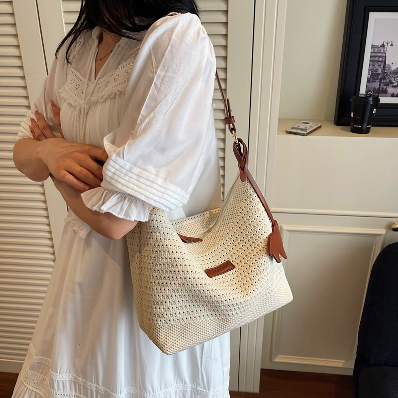 designer Beach Vacation Woven Bag for Women 2025 New Hollow Knit Handbag Large Capacity Shoulder Underar