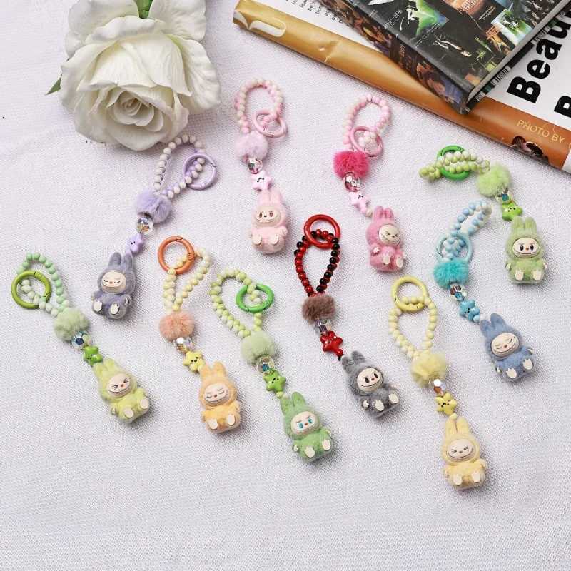 Kawaii Mini Labubu Keychain Cartoon Creative Three-dimensional Doll Students Schoolbag Pendant Car Key Chain Women and Men Gifts XJ250607
