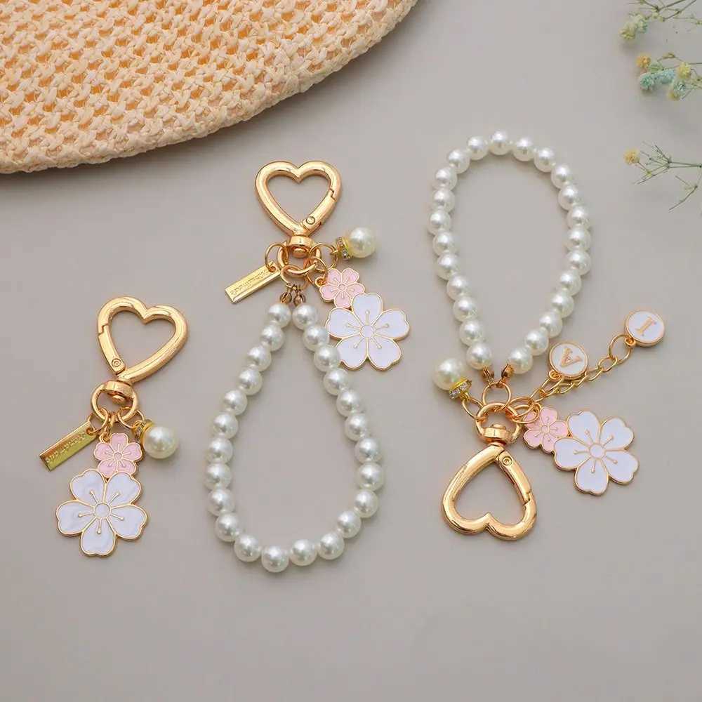 Lovely Cherry Blossoms Keychain Pearl Chain Letter Pendant Women Car Key Ring Headphone Case Charms Bag Decor Accessories XJ250607