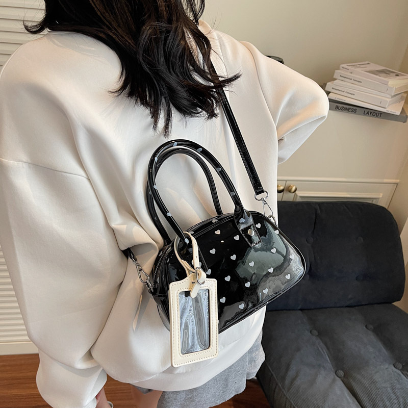 designer Korean Style Cute Polka Dot Handbag for Women 2025 New Niche Design Handheld Bag Commuter Shoulder Crossbody Small Bag