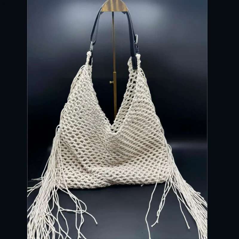 2025 New Woven Hollow Women's Handbag Shoulder Fashion Tassel Large Capacity Tote Bag