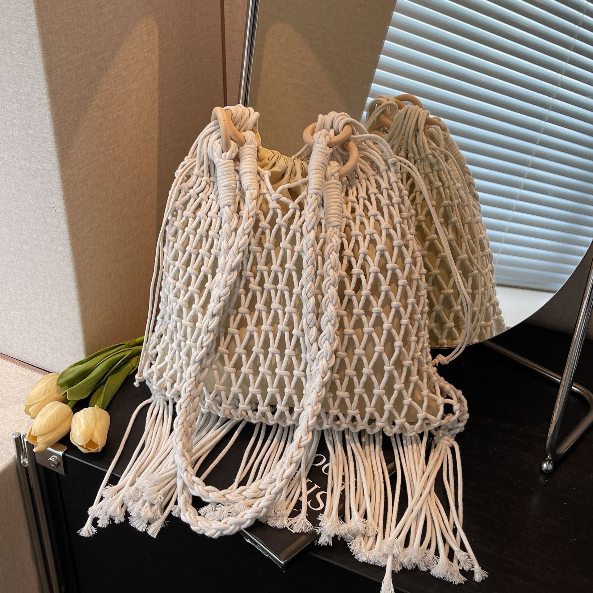 designer 2025 New Mesh Shoulder Underarm Bag Simple Woven Cotton Rope Bag Hollow Fishnet Bag Beach Vacation Tot