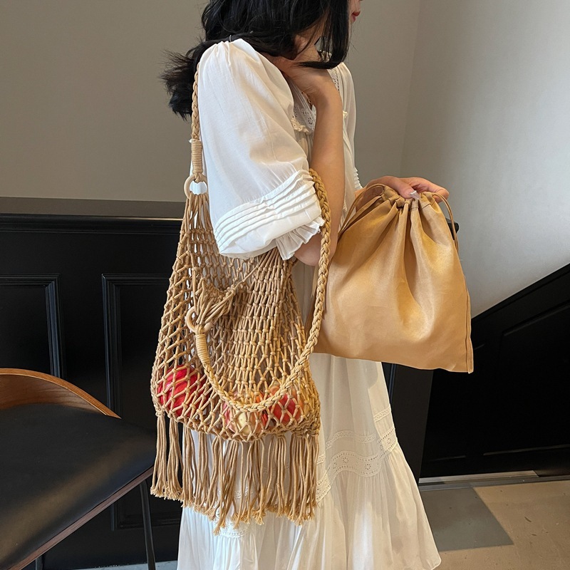 designer 2025 New Mesh Shoulder Underarm Bag Simple Woven Cotton Rope Bag Hollow Fishnet Bag Beach Vacation Tot