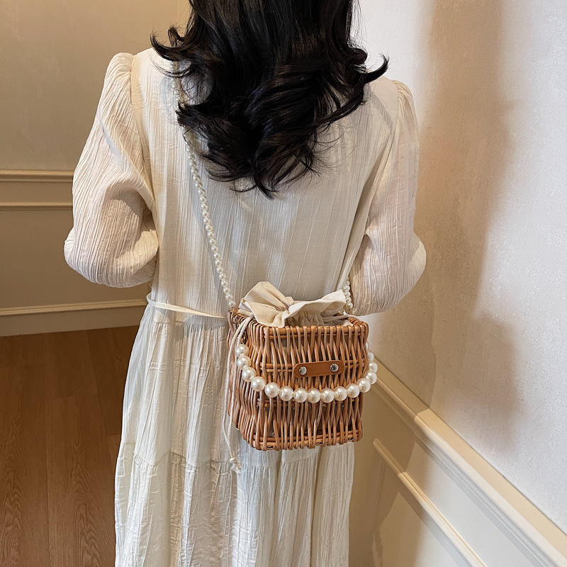 designer bag High-end Pearl Chain Handbag for Women 2025 New Woven Straw Shoulder Crossbody Bucket Bag