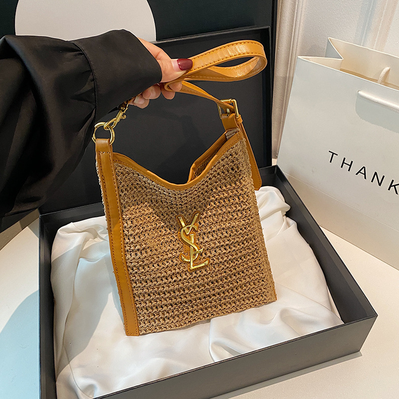 Women's summer woven bags small hollow underarm commuting shoulder bag 2025s hot