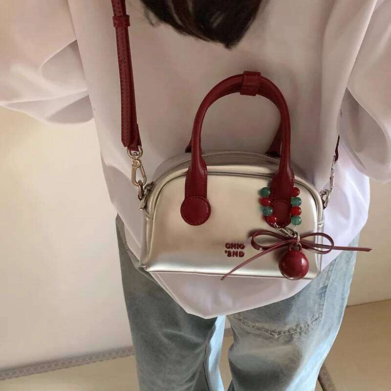 Sier Commuter Shoulder Bags Women Designer Handbags With Red Ball Pendant Causal Large Capacity Pillow Underarm Bag