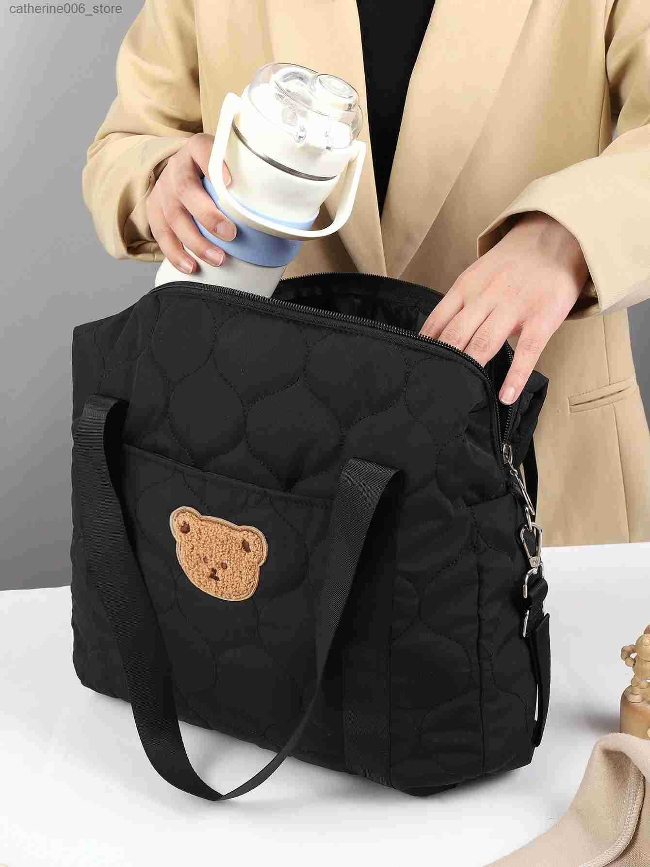1 piece of hand-held changing bag mother-and-baby bag out-of-the-box portable storage bag trolley hanging bag y2506099DVJ