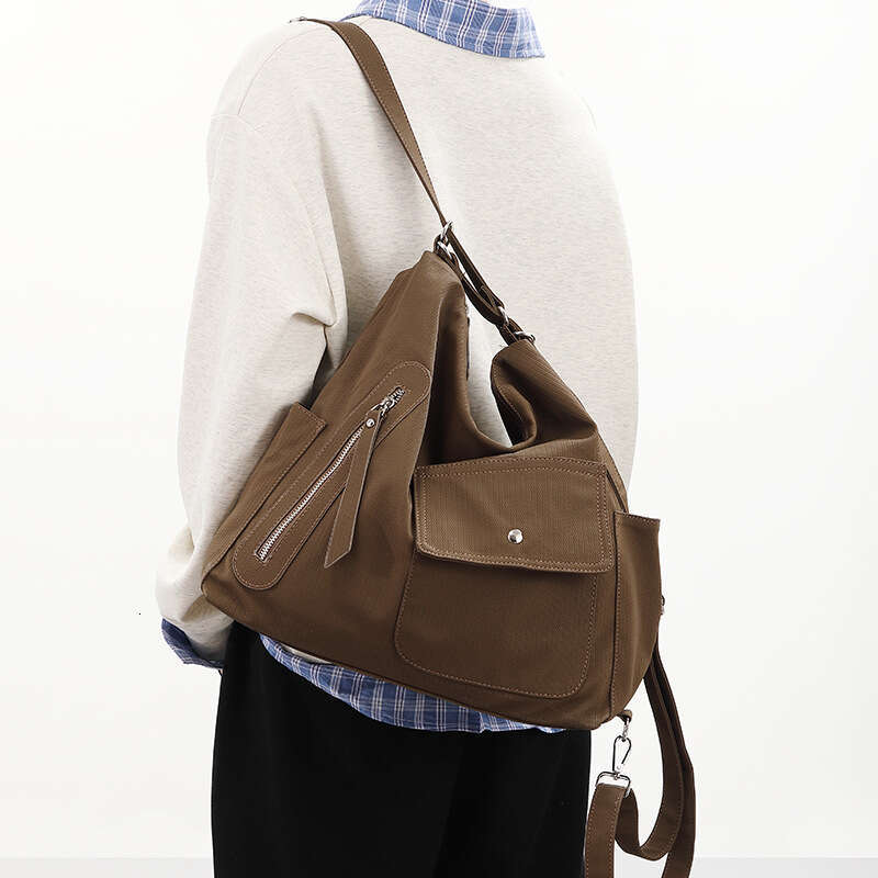 This Year's Spring and Autumn New Women's Large Capacity Waterproof PU Shoulder Bag Fashion Versatile Unisex Backpack
