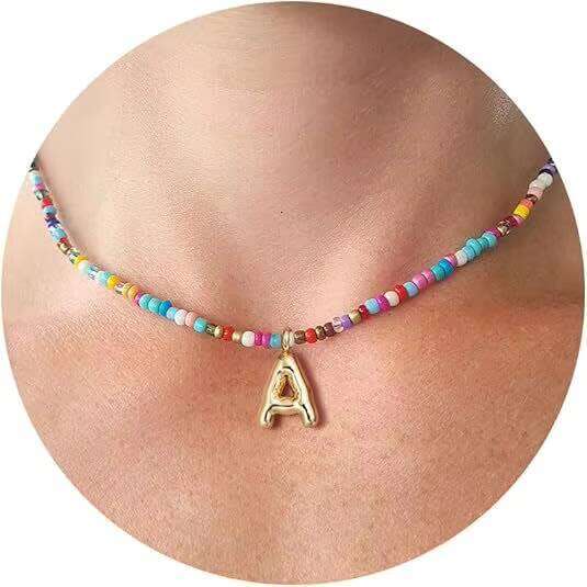 DHcollections Hot Selling Bohemian Colorful Rice Bead Bubble Letter Handcrafted Beaded Beach Necklace for Women