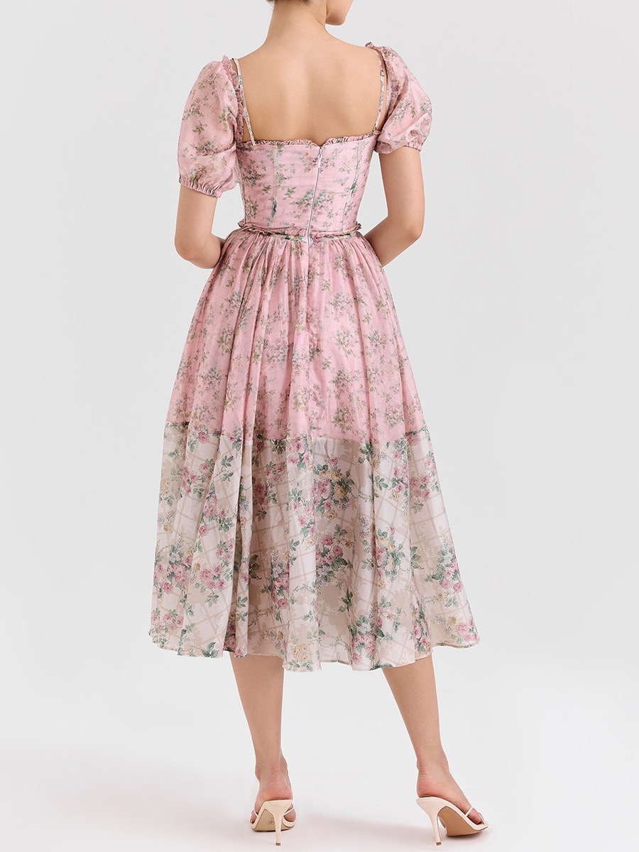 French-style sweet floral dress with plunging neckline and backless design, cinched at the waist for a slimming effect and a sophisticated look. Women