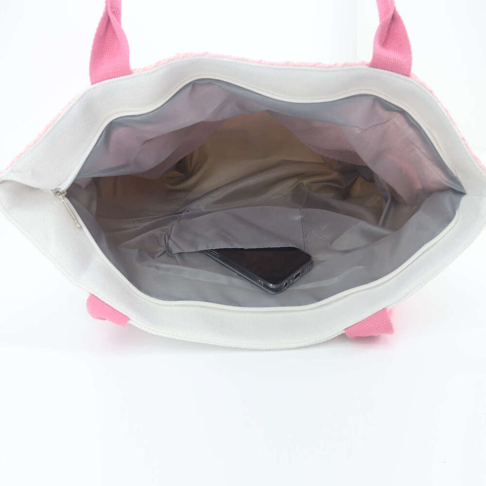 New Canvas Fashion Beach Niche Embroidered Eye Handheld Paper Straw Large Capacity Crossbody Bag