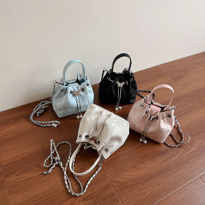 National Style Embossed Bucket New Drawstring Niche Design Women's Shoulder Versatile Chain Crossbody Bag For Outings