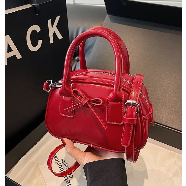 Free Shipping 2025 New Designer Bag Fashion Texture Oil Wax Leather Luxury Wallet Handheld Bowling Bag Niche Trend Bow Multifunctional Handbag