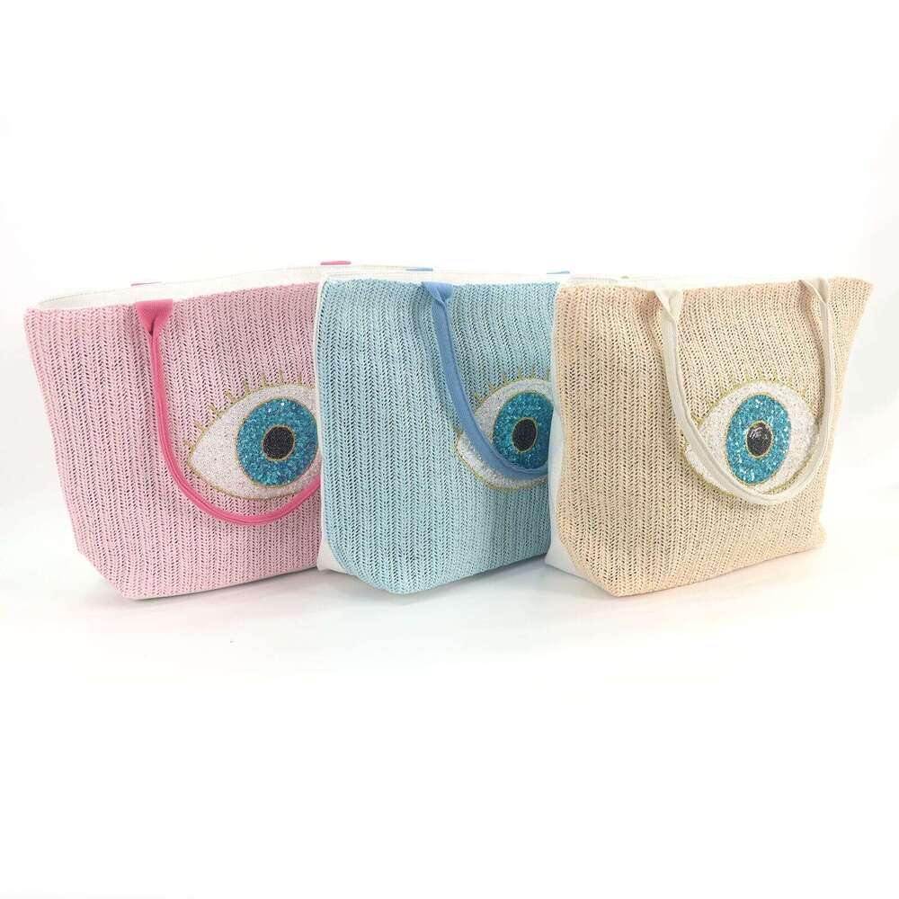 New Canvas Fashion Beach Niche Embroidered Eye Handheld Paper Straw Large Capacity Crossbody Bag