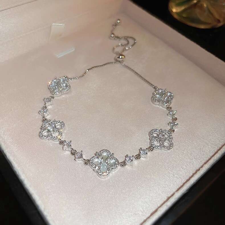designer Jewelry New high-end four petal zircon lucky clover with light and adjustable temperament bracelet decoration