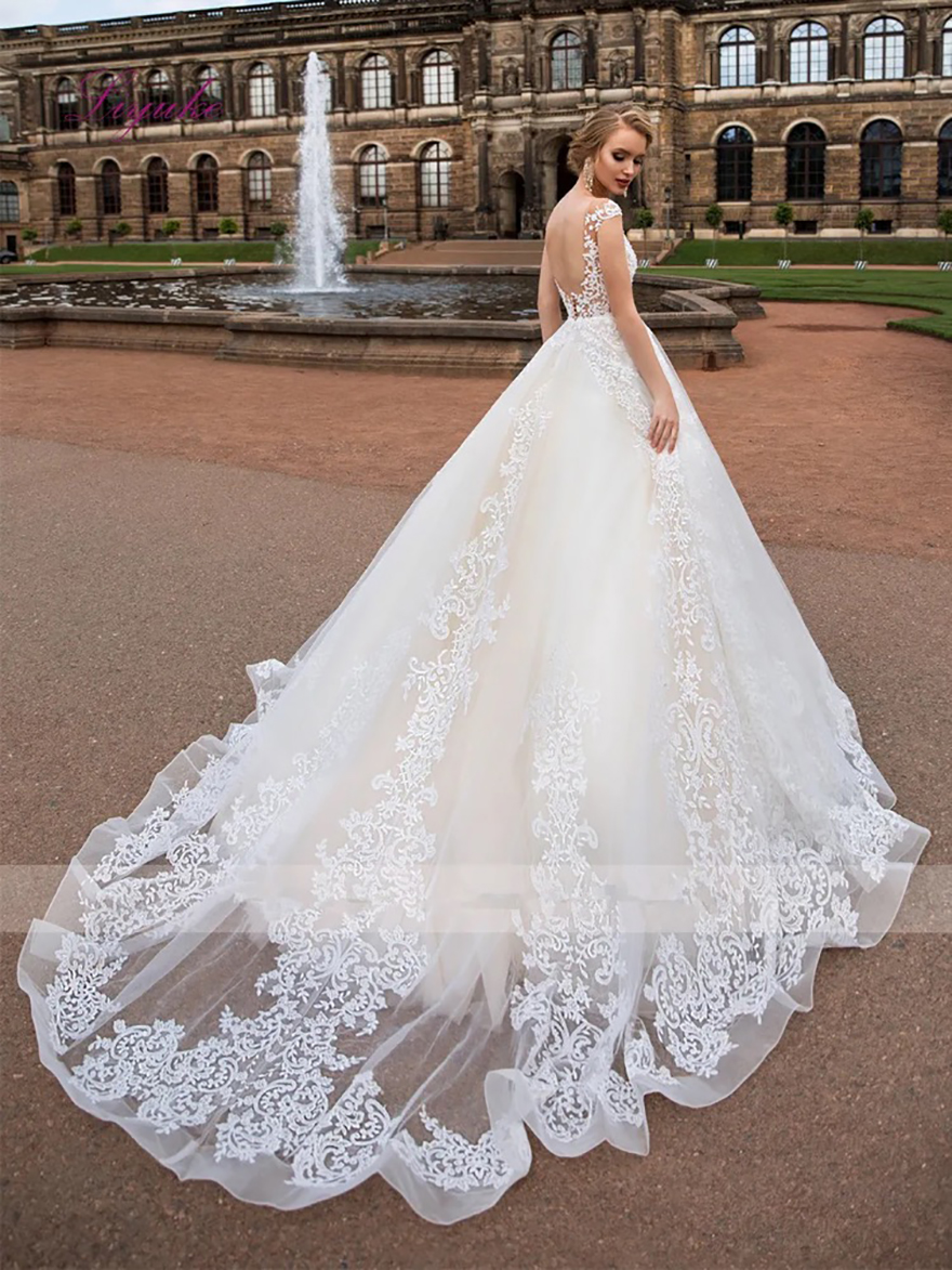 Sheer Cap Sleeves Lace A Line Wedding Dresses Mesh Top Applique Open Back Bridal Wedding Gowns robes de mariee