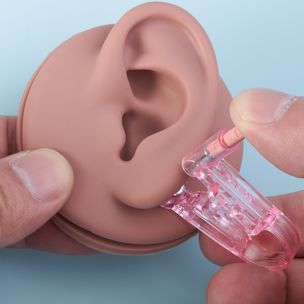 The first generation multi-color earring tool has a built-in 4mm head earring, which is fast easy to operate sterile not easily infected