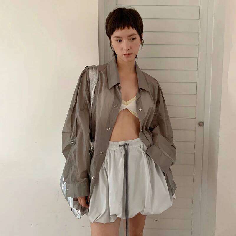 DEAT Fashion Khaki Micro Transparent Sunscreen Shirt Women's Lapel Loose Fit Single Breasted Blouse Summer New 7Ab9501