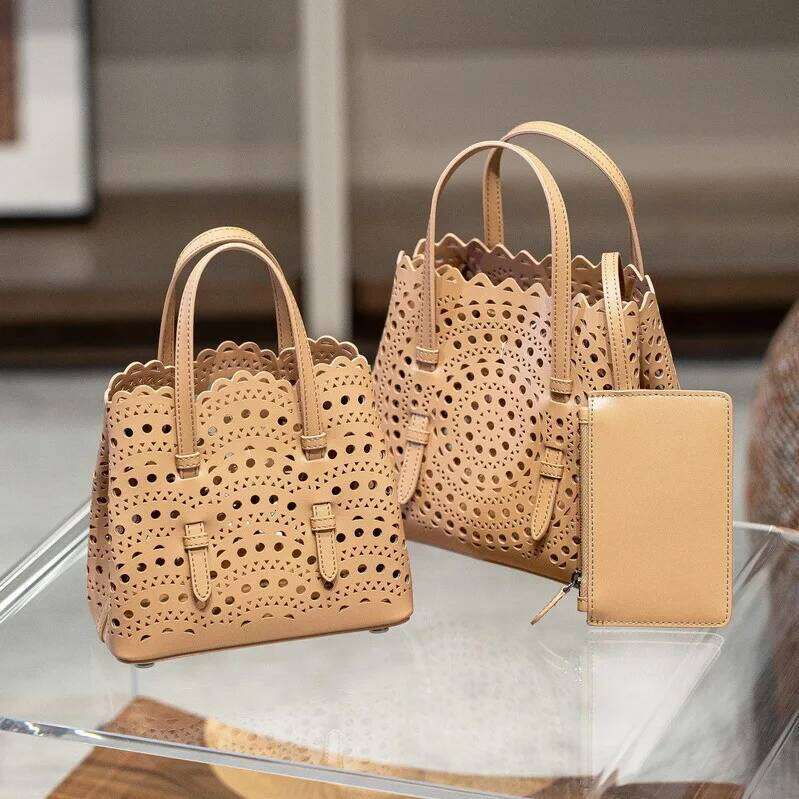 High-Grade Hot Girl Hand-Held Tote Female 2025 New Niche Design Retro Versatile Shoulder Bag