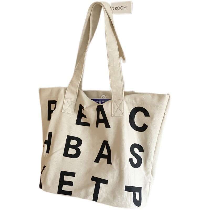2023 Korean Style Custom Magnetic Buckle Horizontal Version Sturdy Thick New Oversized Letter Inner Pocket Tote Canvas Bag Trendy