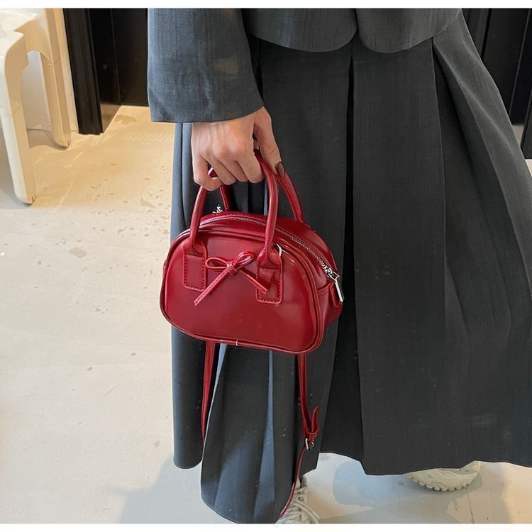 Free Shipping 2025 New Designer Bag Fashion Texture Oil Wax Leather Luxury Wallet Handheld Bowling Bag Niche Trend Bow Multifunctional Handbag