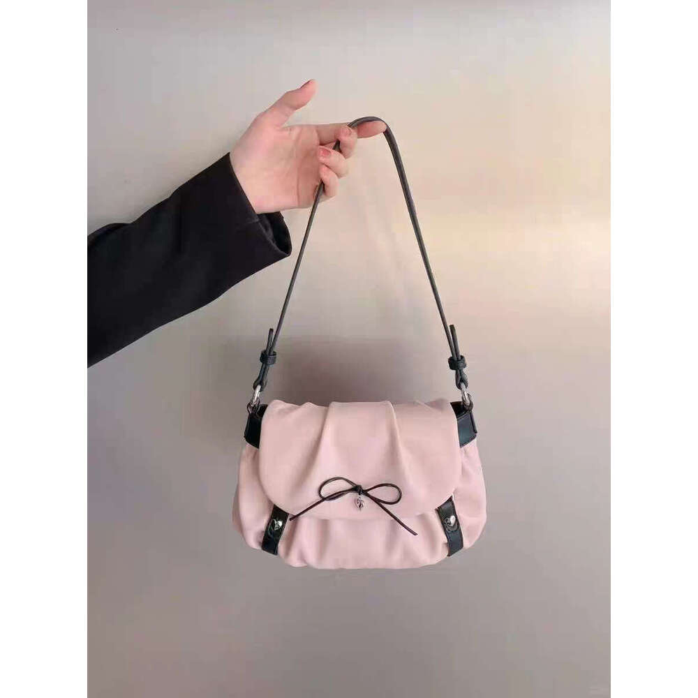 2025 New Pink Cute Girl Shoulder Fashion Versatile Bow Cloud Niche Texture Underarm Bag